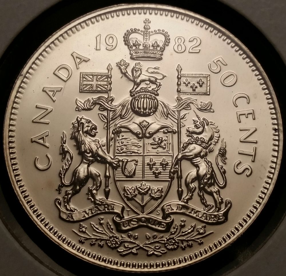 1982-Half-Dollar-Specimen-With-Double-Date-And-Missing-Denti